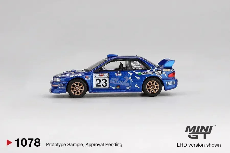 MINI GT 1:64 Porsche 911 GT3 R #77 AO Racing "Skeleton Rexy" 2025 IMSA Petit Le Mans & Subaru Impreza WRC99 #23 2000 Acropolis Rally Die-Cast Model Car Set