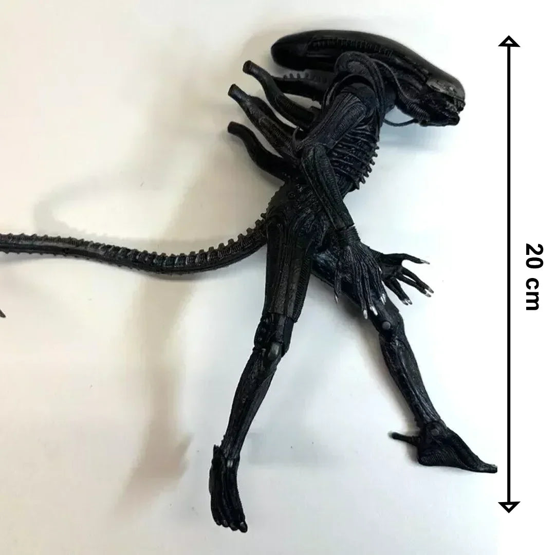 Black alien action figure, 20 cm tall, with detailed body, claws, and long tail on white background