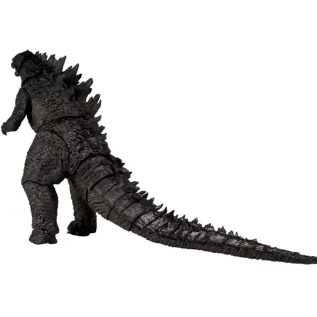 Black Godzilla action figure toy with textured scales and long tail on white background