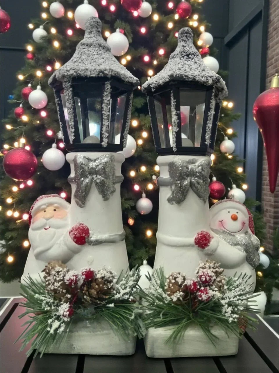 Snow Lantern Christmas Figurine Set | Santa & Snowman with Pinecones & Snowy Greens – Festive Table Décor Pack of 2