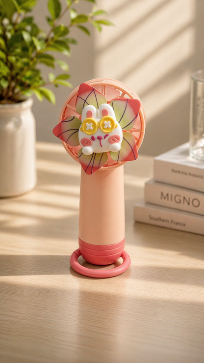 Portable Handheld Mini Fan – Cute Cartoon Personal Cooling Fan with Stand for Travel, Office & Outdoor Use (Pack of 1)