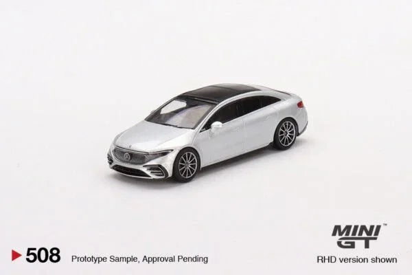 Die-cast silver model car with black roof on white background, MINI GT collectible toy