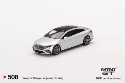 Die-cast silver model car with black roof on white background, MINI GT collectible toy