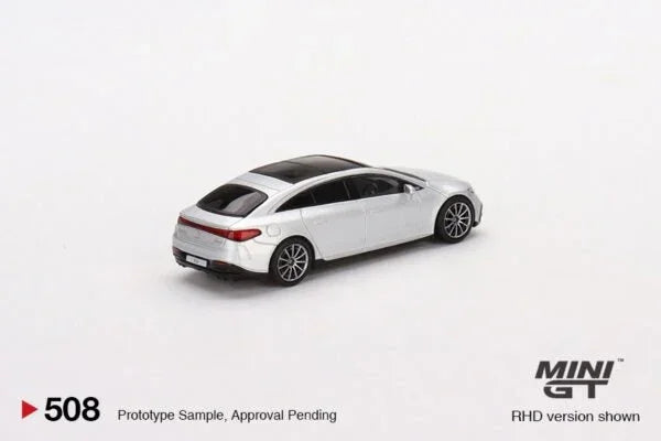 Die-cast model white sports car with black roof, displayed on white background