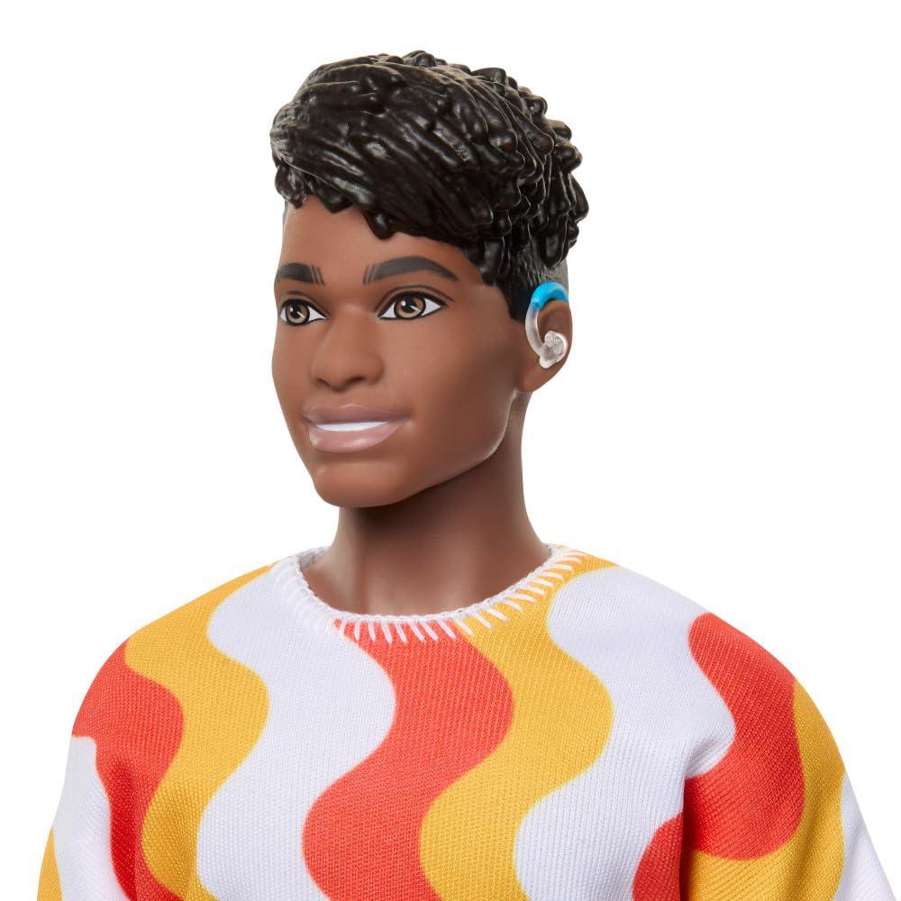 Barbie Fashionistas Ken Doll #220 with Behind-The-Ear Hearing Aids & Broad Body Wearing a Removable Orange Patterned Shirt, Shorts & Jelly Sandals - Jaiman Toys