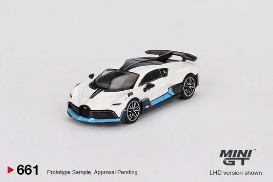 White and blue diecast sports car toy model with rear spoiler, Mini GT collectible.