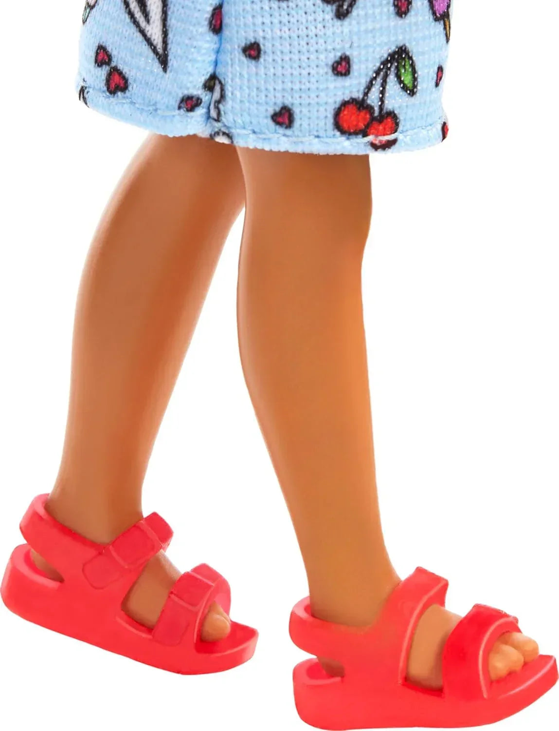 Barbie Chelsea Doll, Small Doll Wearing Removable Blue Dress with Colorful Print & Pink Shoes, Brown Hair & Green Eyes - Jaiman Toys