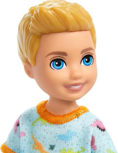 Barbie Chelsea Doll, Small Boy Doll Wearing Removable One-Piece with Dinosaur Print & White Shoes, Blond Hair & Blue Eyes - Jaiman Toys