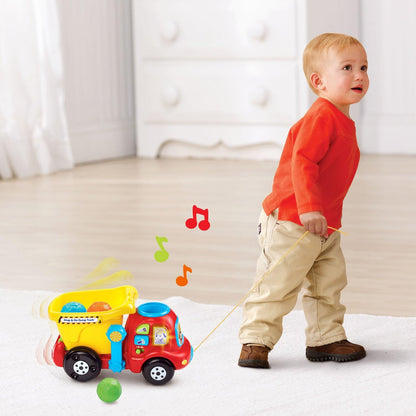 VTech Drop and Go Dump Truck | Interactive Learning Construction Truck with Lights, Sounds & Music | Yellow