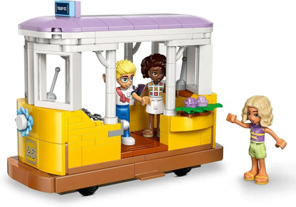 LEGO Friends 42671 Plant Café & Flower Shop Toy - Building Set with 4 Mini Dolls, a Cat Figure, a Tram and Kitchen Accessories incl. Pastries, Cups & a Teapot - Birthday Gift for 9+ Year Old Girls