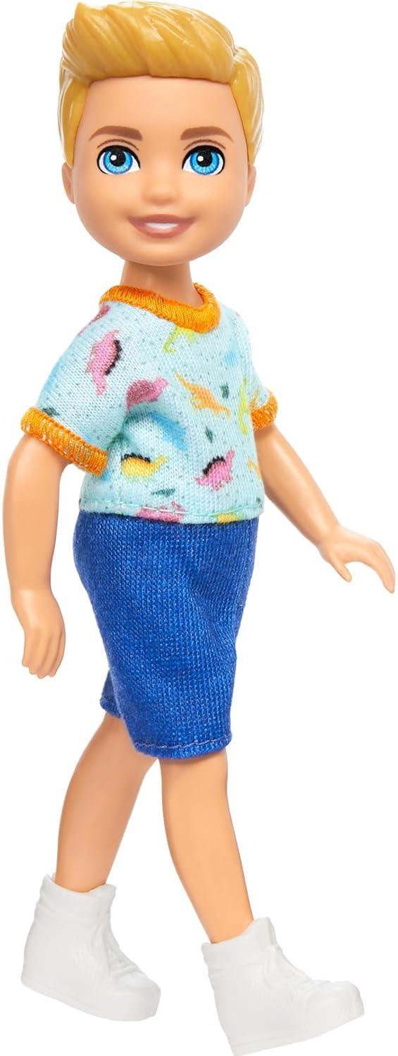 Barbie Chelsea Doll, Small Boy Doll Wearing Removable One-Piece with Dinosaur Print & White Shoes, Blond Hair & Blue Eyes - Jaiman Toys
