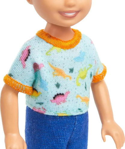 Barbie Chelsea Doll, Small Boy Doll Wearing Removable One-Piece with Dinosaur Print & White Shoes, Blond Hair & Blue Eyes - Jaiman Toys