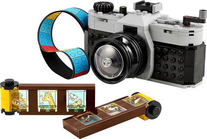LEGO camera building set with colorful strap and toy film strips featuring animal images