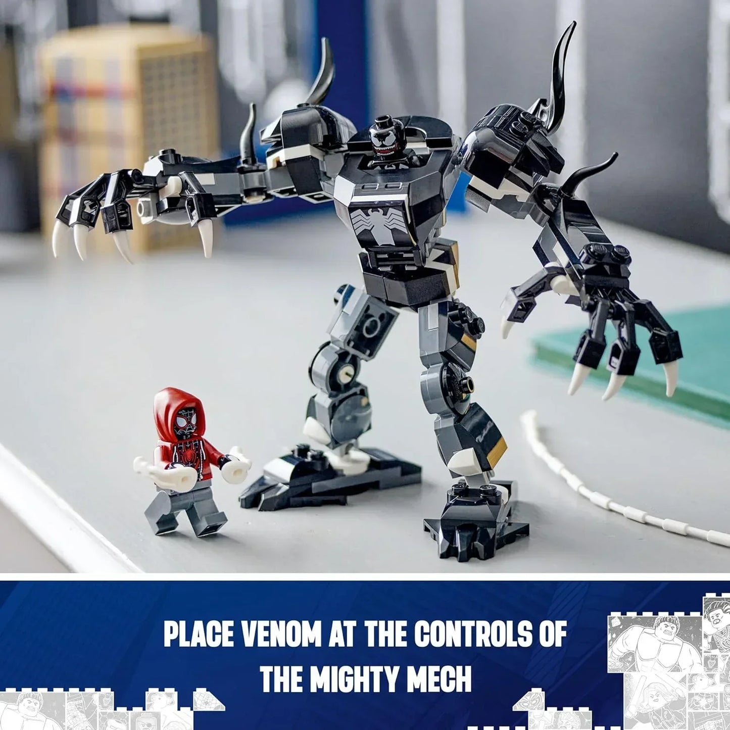 LEGO Venom Mech building toy with poseable black robot and minifigure on a desk