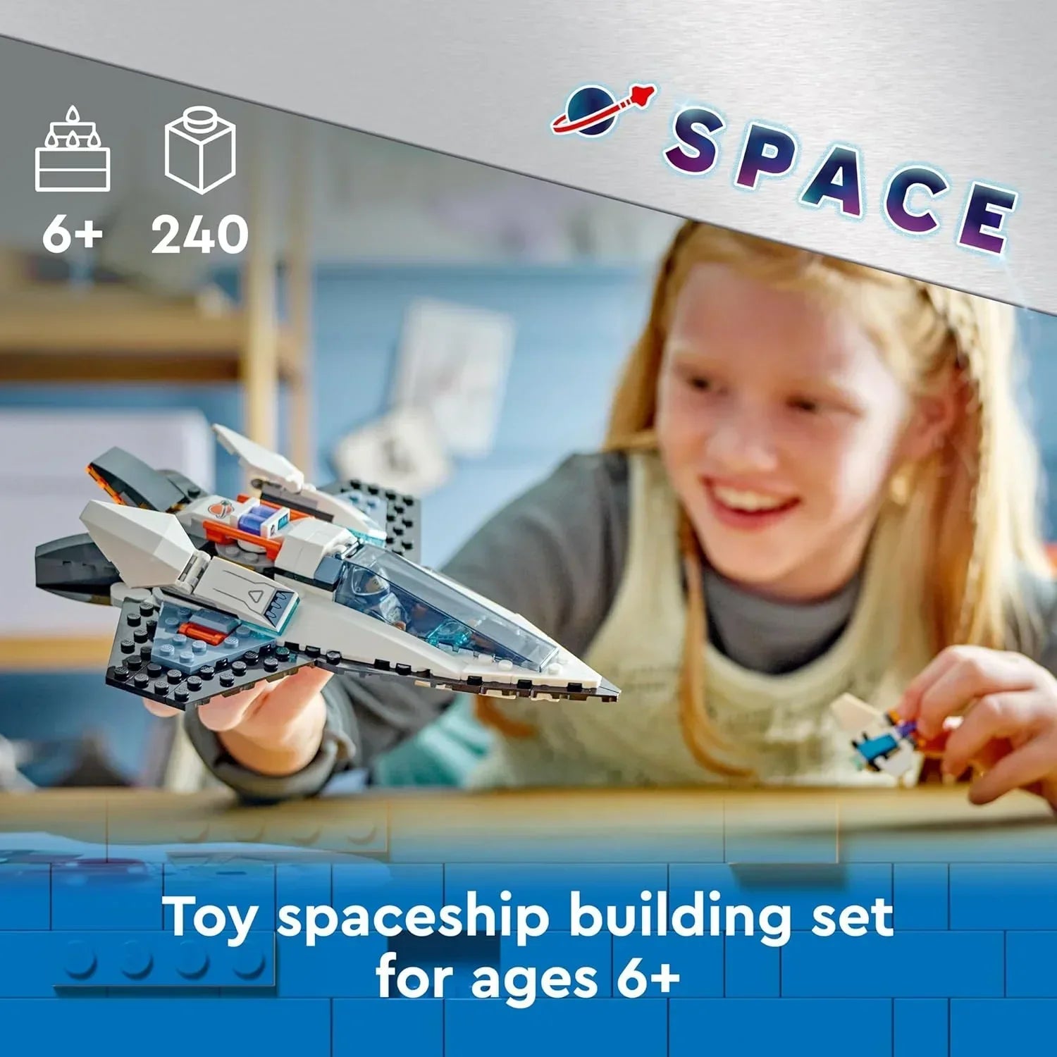 Child playing with space-themed toy spaceship building set, 240 pieces, for ages 6 and up