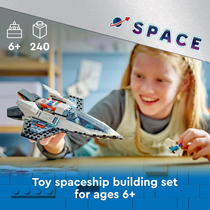 Child playing with space-themed toy spaceship building set, 240 pieces, for ages 6 and up
