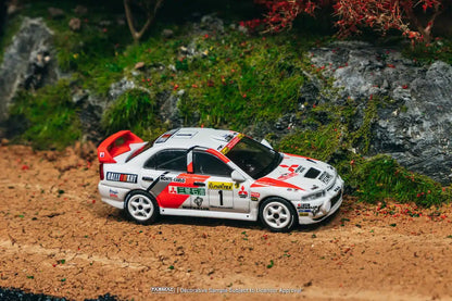 Tarmac Works GLOBAL64 1:64 Mitsubishi Lancer Evolution IV Rallye Monte-Carlo 1997 Diecast Model Car (T64G-076-97MCR01)