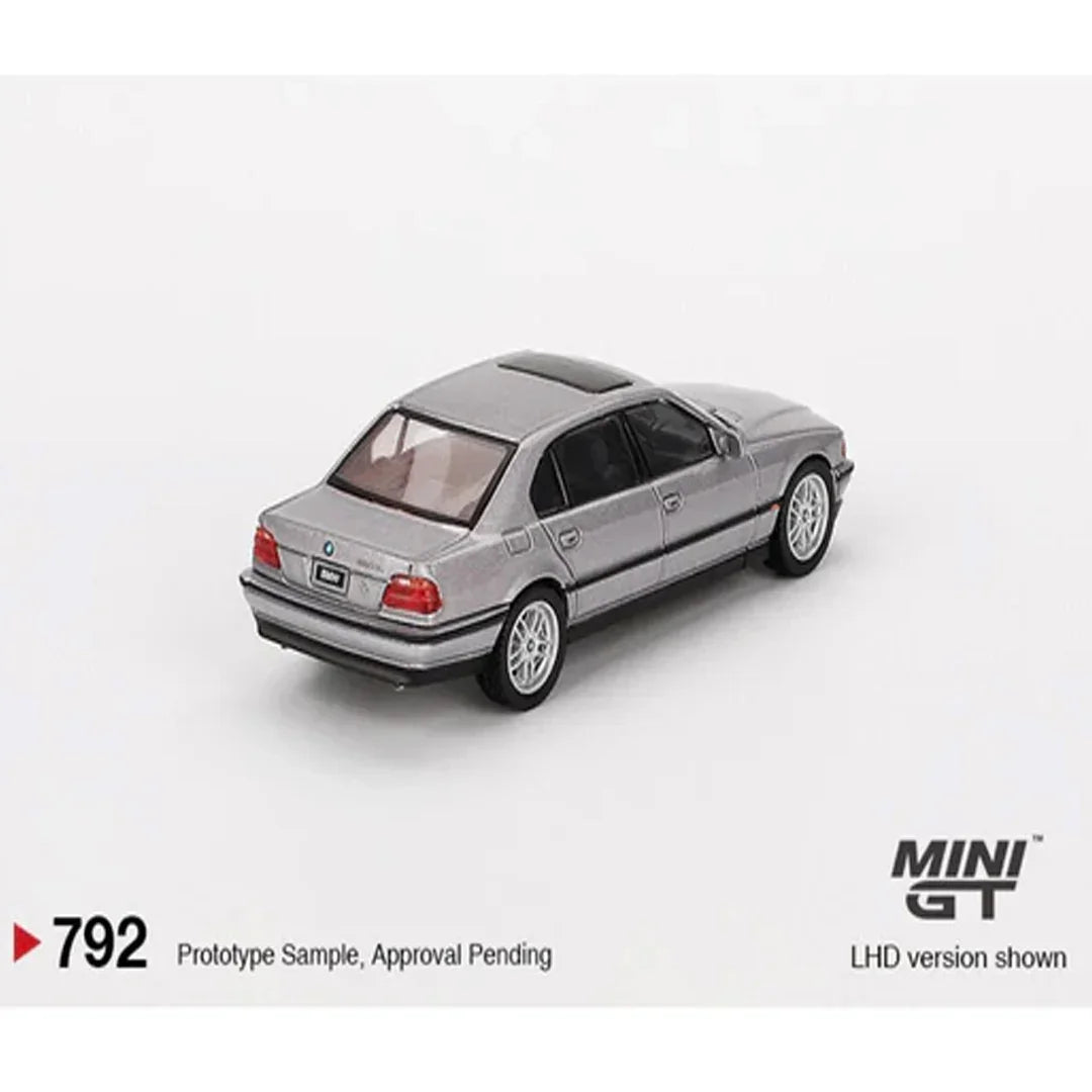 MINI GT 1:64 BMW 750iL Aspen Silver Metallic Diecast Model Car – Luxury Sedan Collectible with Display Box