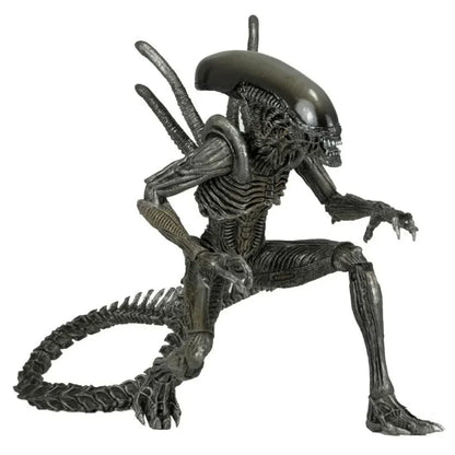 Alien action figure collectible in crouching pose with detailed black exoskeleton