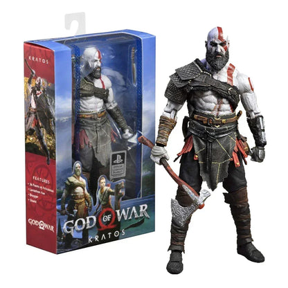 Kratos God of War action figure with axe, displayed next to branded box packaging.
