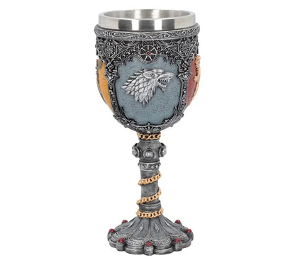 Decorative medieval-style goblet with wolf emblem, ornate detailing, collectible tabletop decor