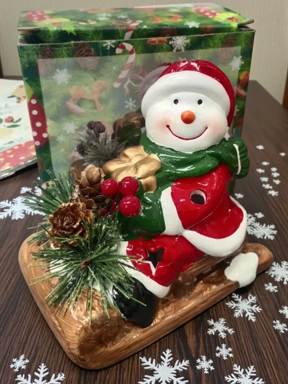 Ceramic Santa on Sled Christmas Figurine – Festive Table Décor with Pinecones & Berries | Holiday Home Decoration (1 Piece)