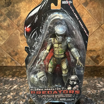 Classic Predator action figure in battle-damaged edition, packaged collectible toy for ages 17+