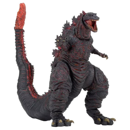 Detailed Godzilla action figure toy with red and black textured scales, posed roaring