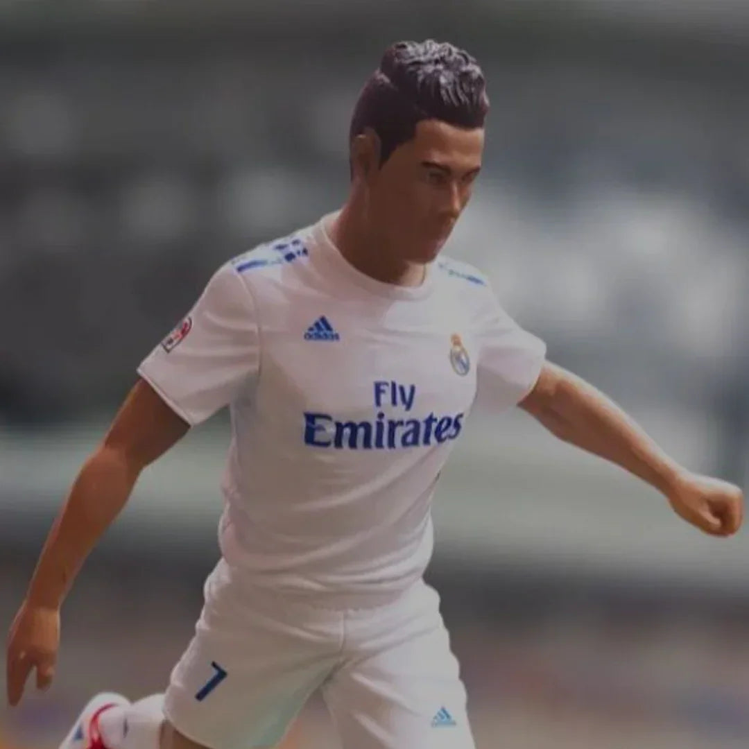 Soccer player action figure in white jersey with number 7, collectible toy for kids