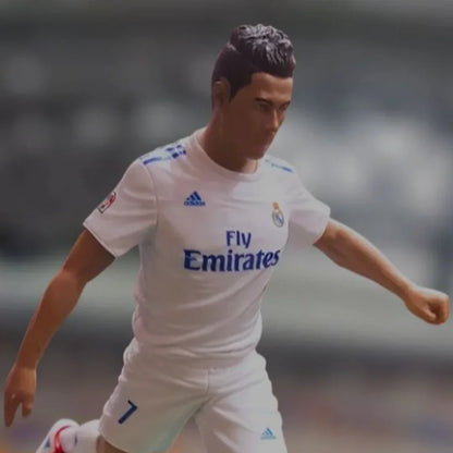 Soccer player action figure in white jersey with number 7, collectible toy for kids