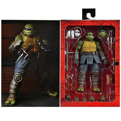 Teenage Mutant Ninja Turtles action figure with interchangeable heads and accessories in box