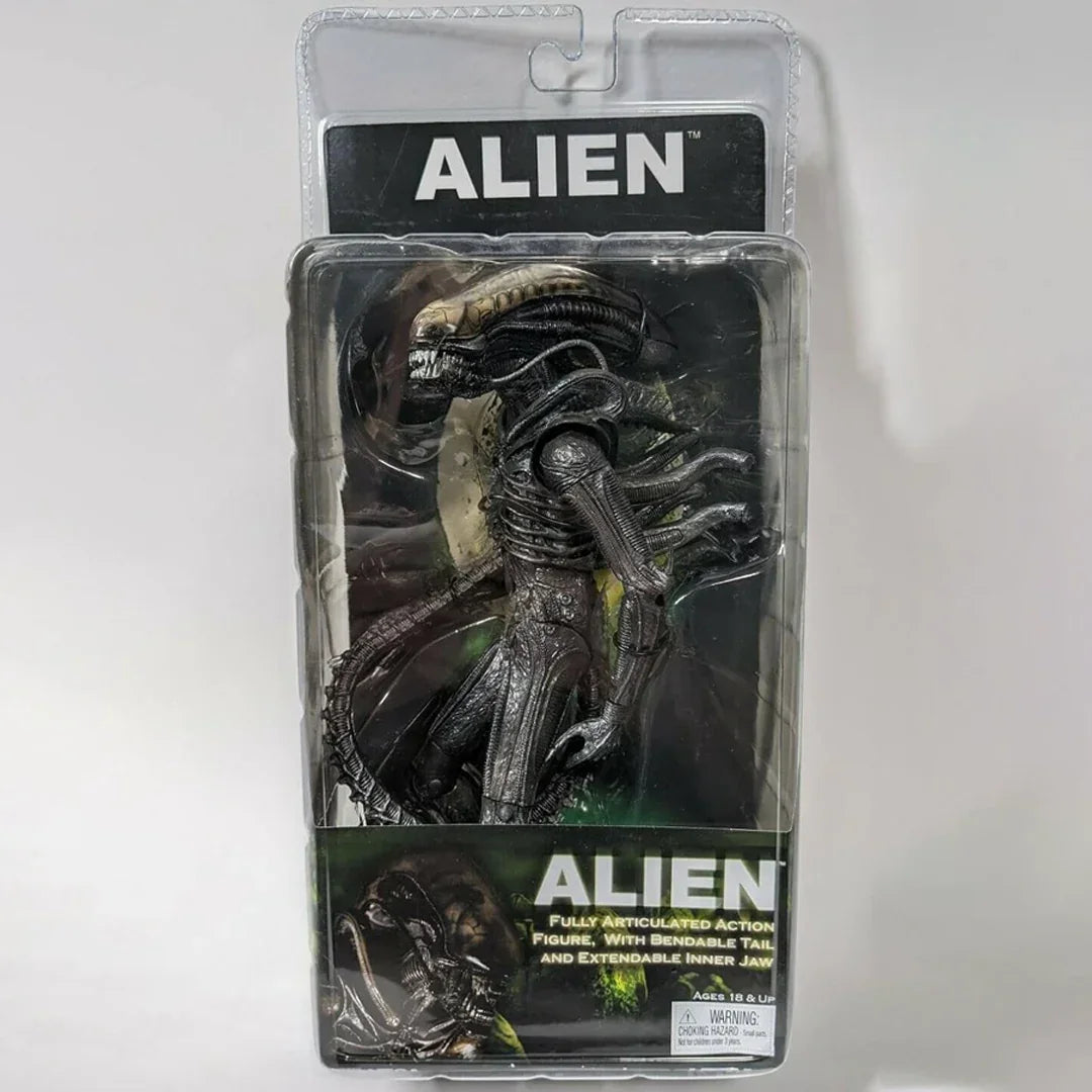 Alien movie collectible action figure in original packaging, bendable tail, sci-fi toy