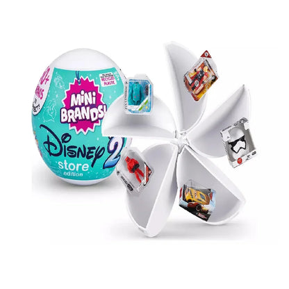 Mini Brands Disney Store Edition surprise ball opened to reveal collectible toy figures.