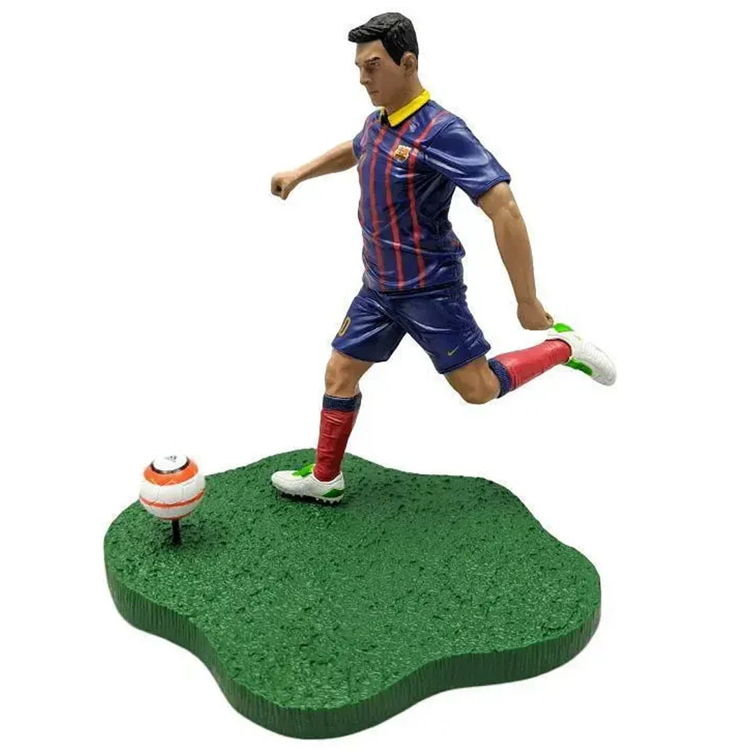 Soccer player action figure in blue and red jersey on green base with soccer ball collectible toy
