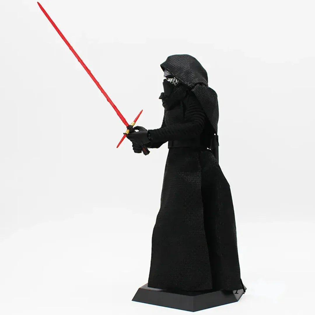 Action figure in black hooded cloak with red crossguard lightsaber on display stand.