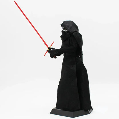 Action figure in black hooded cloak with red crossguard lightsaber on display stand.
