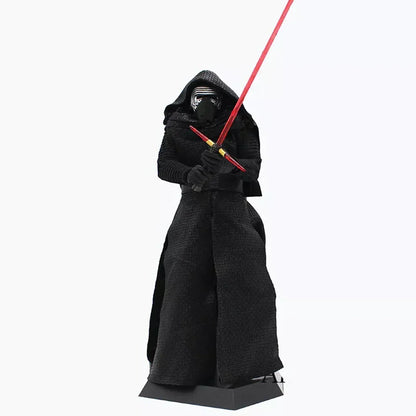 Star Wars action figure in black cloak with red lightsaber collectible toy
