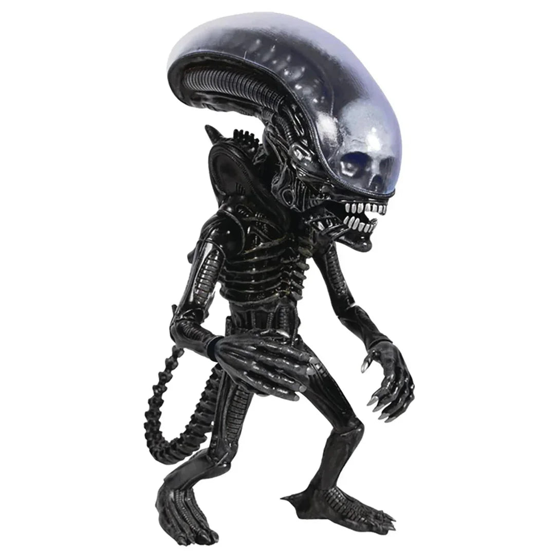 Black alien action figure collectible toy with elongated head and detailed body features