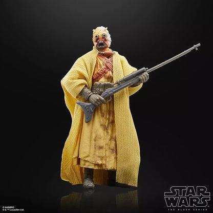 Star Wars Black Series Tusken Raider action figure in yellow robe holding rifle, collectible toy.