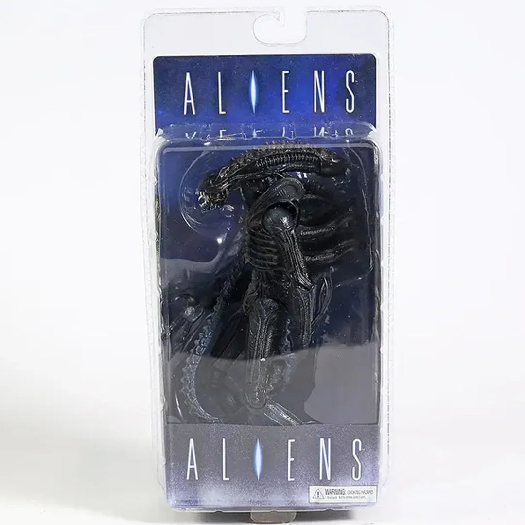 Aliens action figure collectible toy in original packaging, black xenomorph creature