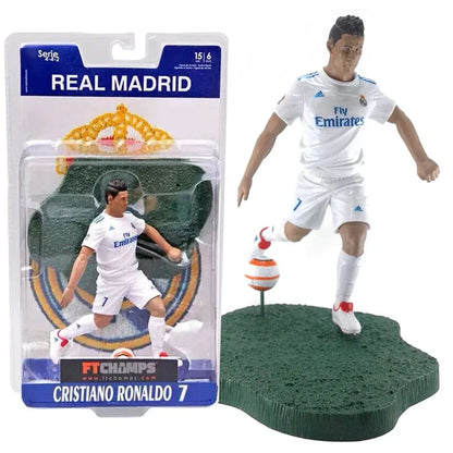 Real Madrid action figure in white soccer uniform with ball, collectible toy for kids and fans