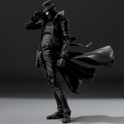 Noir action figure in trench coat and hat, collectible toy with dramatic cape detail