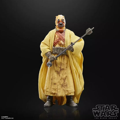 Star Wars Black Series Tusken Raider action figure with robe and staff on black background
