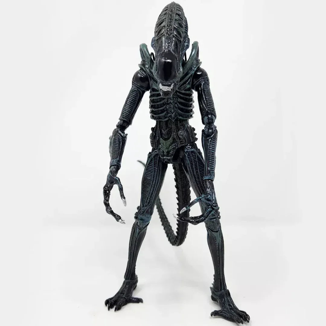 Detailed black alien action figure collectible toy with elongated head and ribbed body on white background