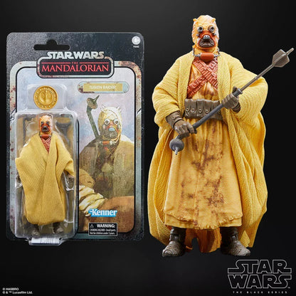 Star Wars The Mandalorian Tusken Raider action figure in yellow robe with staff, packaging shown.