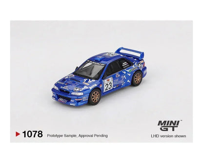 MINI GT 1:64 Porsche 911 GT3 R #77 AO Racing "Skeleton Rexy" 2025 IMSA Petit Le Mans & Subaru Impreza WRC99 #23 2000 Acropolis Rally Die-Cast Model Car Set