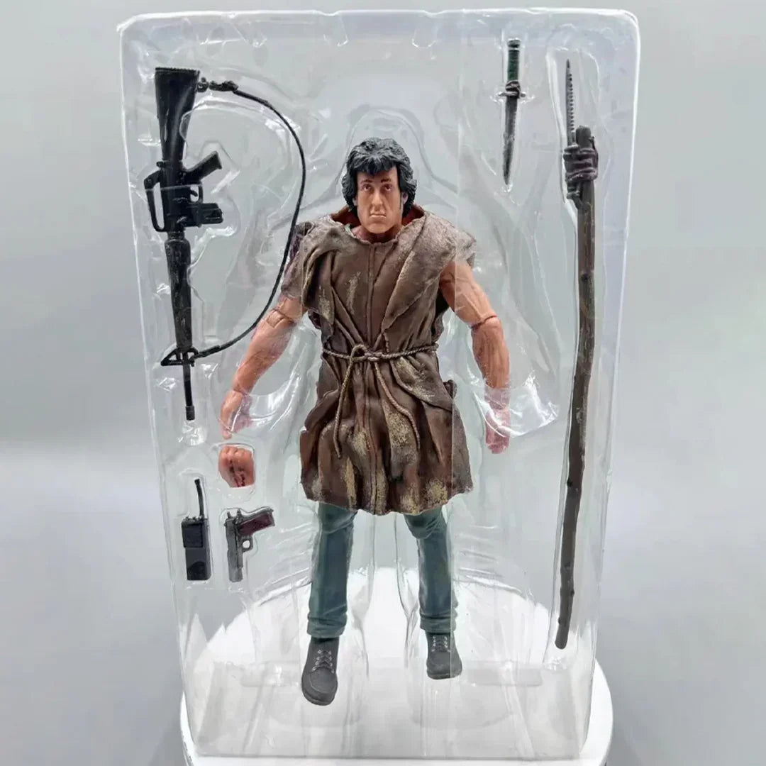 Action figure with brown cloak, rifle, pistol, knife, walkie-talkie, and spear accessories