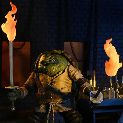 Mutant turtle action figure holding flaming swords in a dark dungeon setting
