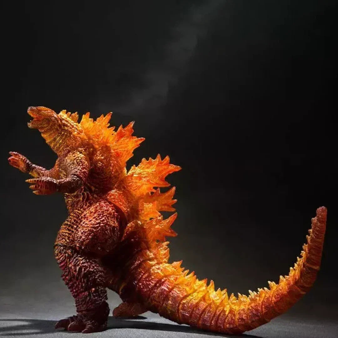 Detailed collectible burning Godzilla action figure with orange fiery spikes, monster toy