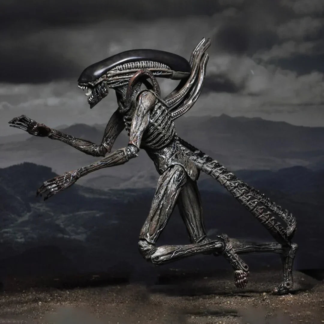 Detailed action figure of a dark, alien creature with elongated head and bony limbs outdoors